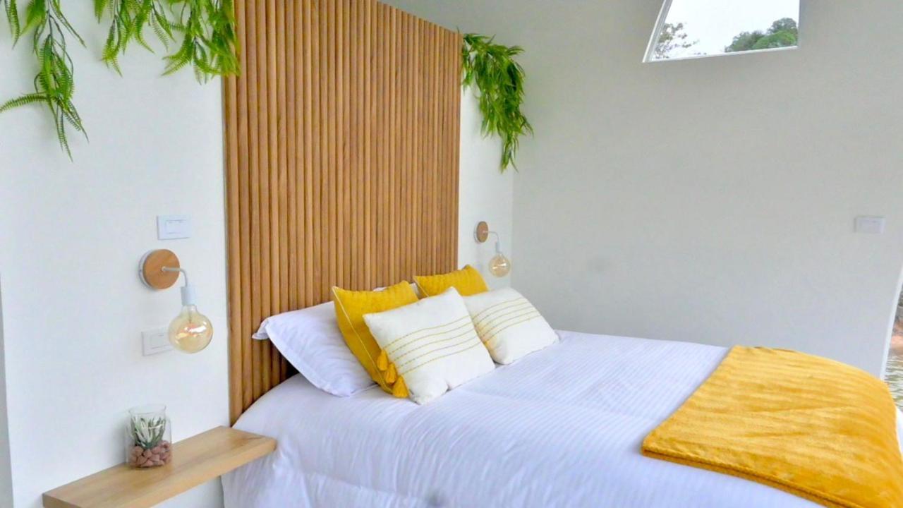 מלון Guatapé Casa Flotante La Trinidad מראה חיצוני תמונה